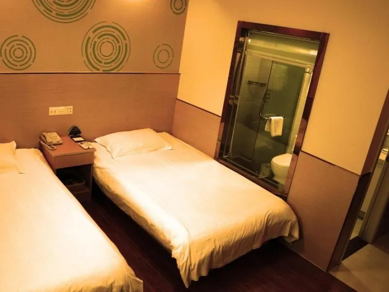 Bed in GreenTree Inn Jiangsu Nanjing Olympic Sports Center Express Hotel