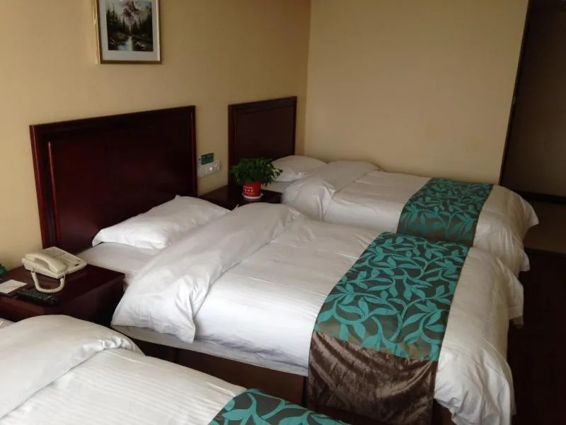 Bed in GreenTree Inn Shandong Zibo Railway Station Jinjing Avenue Business Hotel