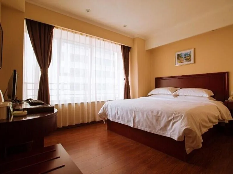 Bed in GreenTree Inn Shandong Zibo Railway Station Jinjing Avenue Business Hotel