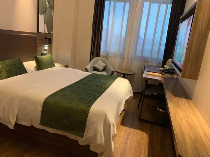 Bed in GreenTree Inn Anhui Lu’an Huoshan Yingjia Avenue Business Hotel