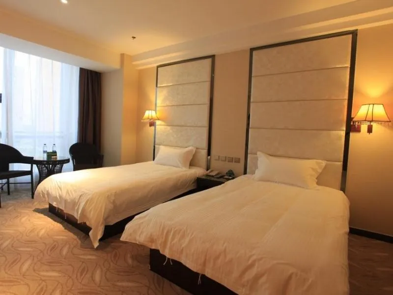 Bed in GreenTree Inn ShanDong North WeiHai StationNorth International Bathing Beach Business Hotel