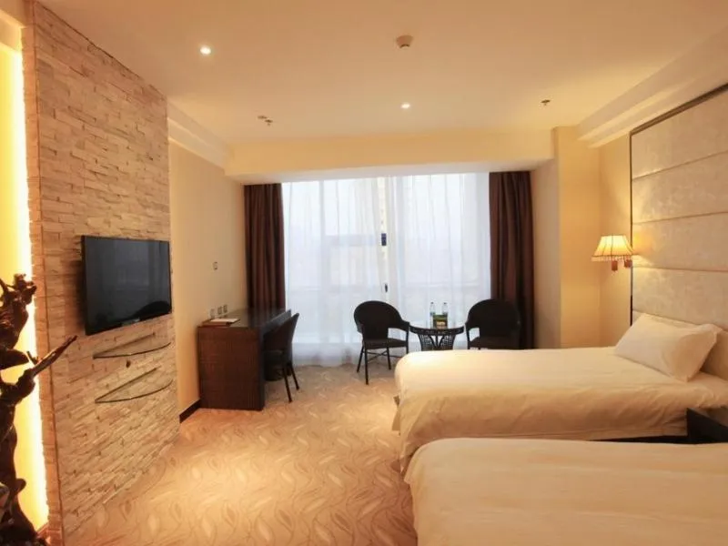 Bed in GreenTree Inn ShanDong North WeiHai StationNorth International Bathing Beach Business Hotel