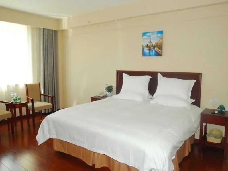 Bed in GreenTree Inn Shandong Weihai Wendeng Darunfa Business Hotel