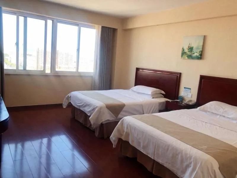 Bed in GreenTree Inn Shandong Weihai Wendeng Darunfa Business Hotel