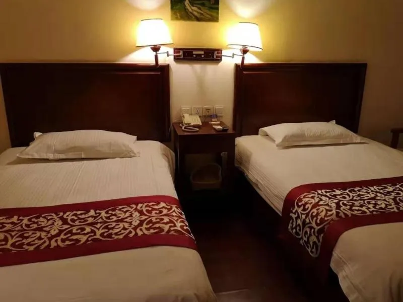 Bed in GreenTree Inn Shandong Rizhao University City Express Hotel