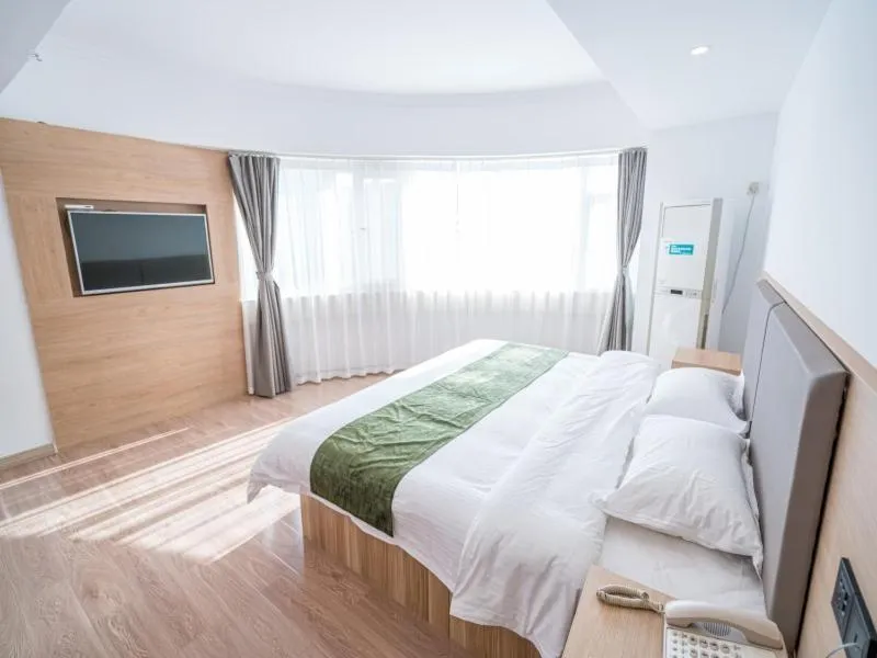 Bed in GreenTree Inn Shandong Rizhao University City Express Hotel