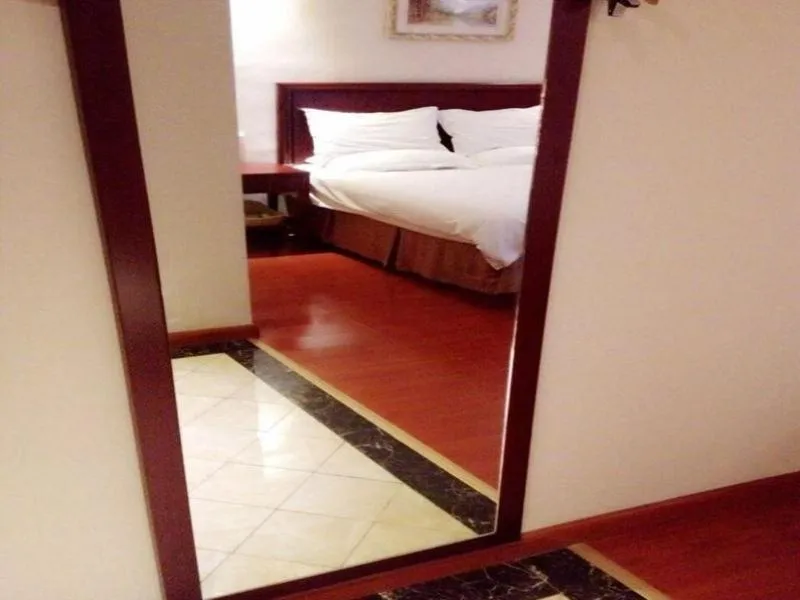 Bed in GreenTree Inn Shandong Liaocheng Chiping East Huixin Road Business Hotel