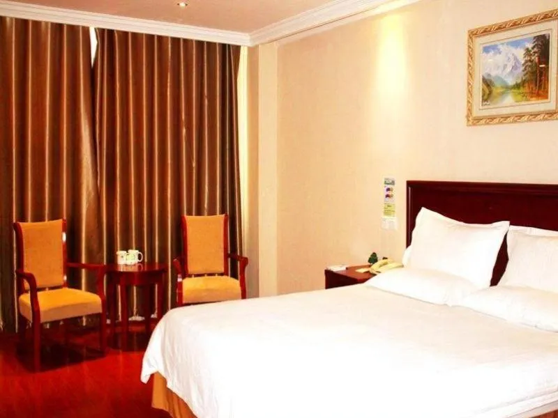 Bed in GreenTree Inn Shandong Liaocheng Chiping East Huixin Road Business Hotel