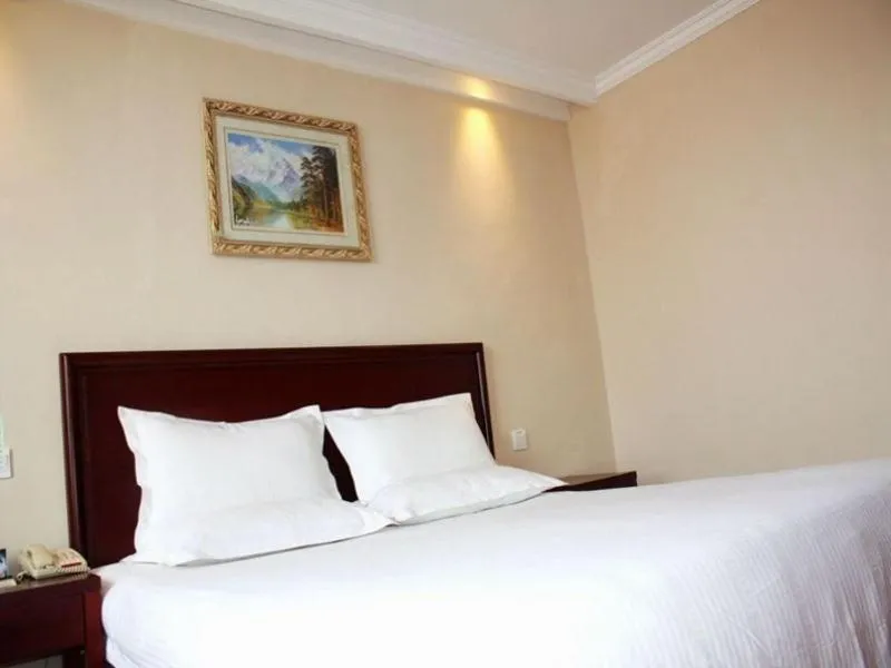 Bed in GreenTree Inn Shandong Liaocheng Chiping East Huixin Road Business Hotel