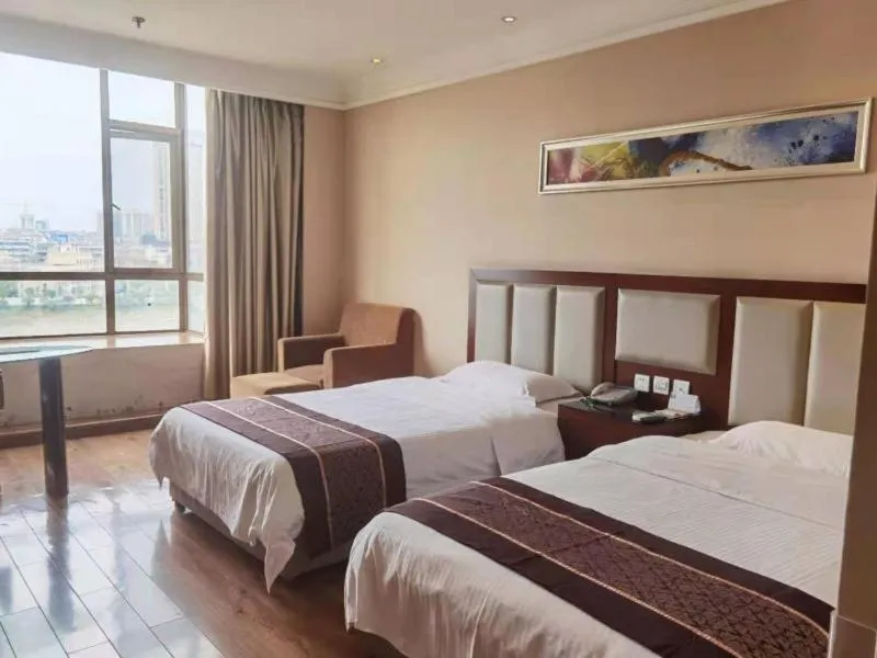 Bed in GreenTree Inn Hubei Huanggang Hong An Wal-Mart Plaza Business Hotel