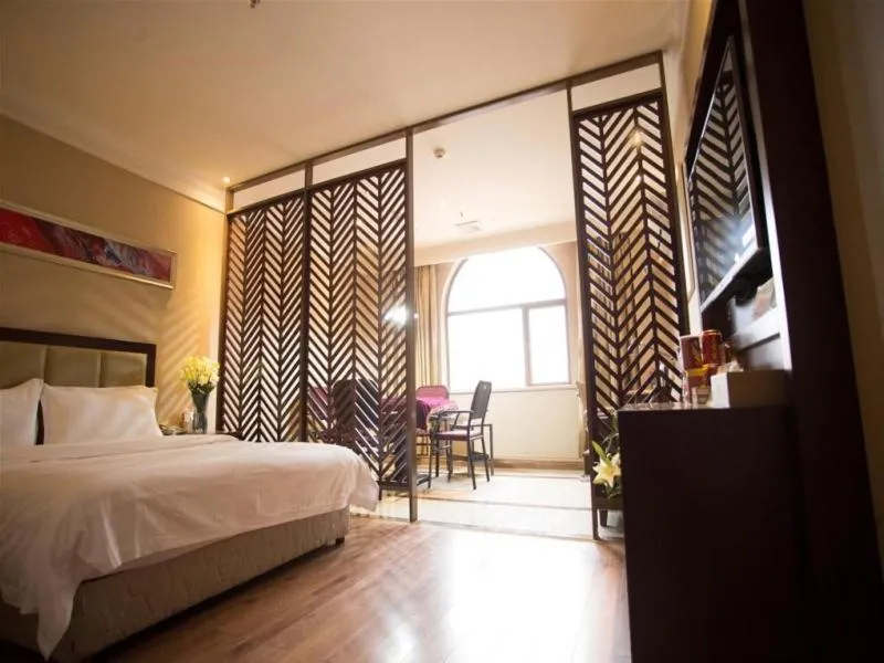 Bed in GreenTree Inn Hubei Huanggang Hong An Wal-Mart Plaza Business Hotel