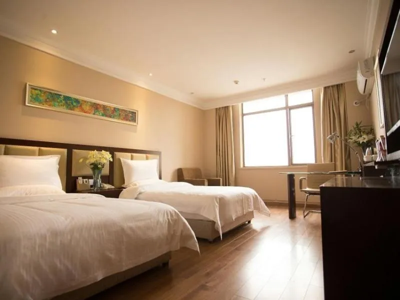 Bed in GreenTree Inn Hubei Huanggang Hong An Wal-Mart Plaza Business Hotel