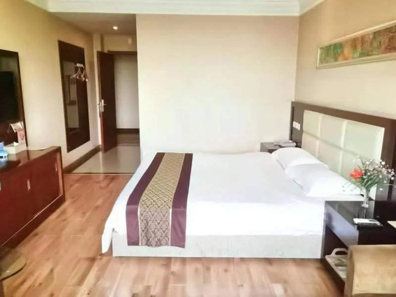 Bed in GreenTree Inn Hubei Huanggang Hong An Wal-Mart Plaza Business Hotel