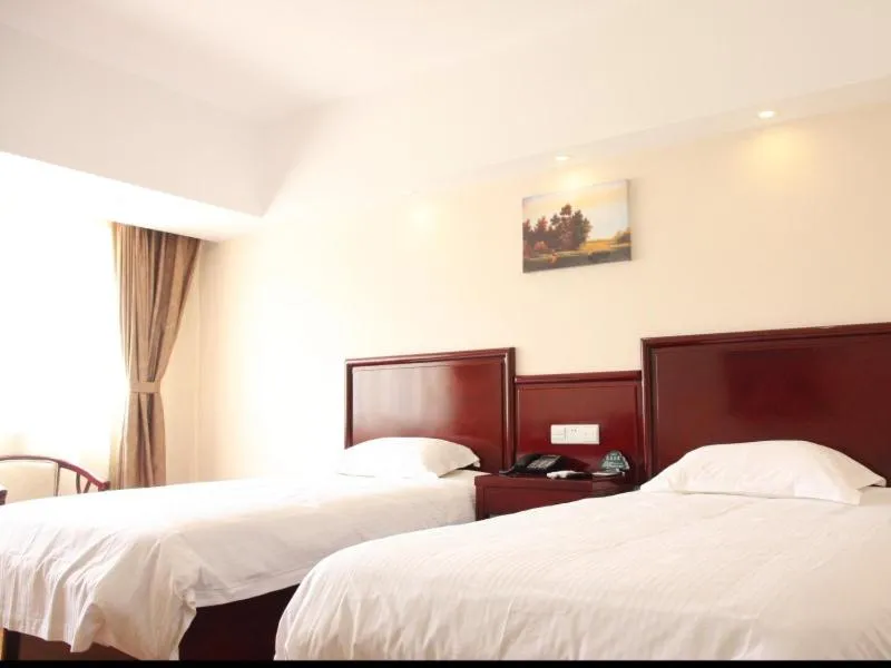 Bed in Greentree Inn Yunnan Lijiang Railway Station Yuxing Road Express Hotel