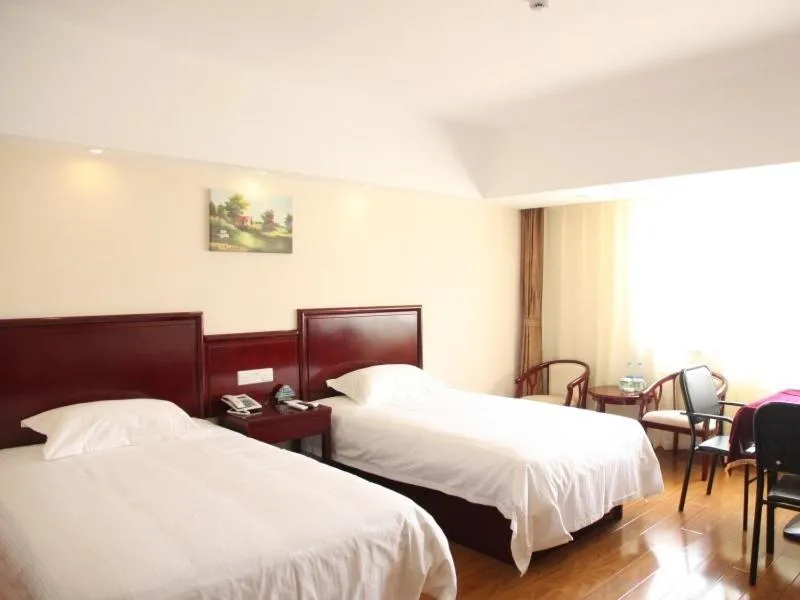Bed in Greentree Inn Yunnan Lijiang Railway Station Yuxing Road Express Hotel