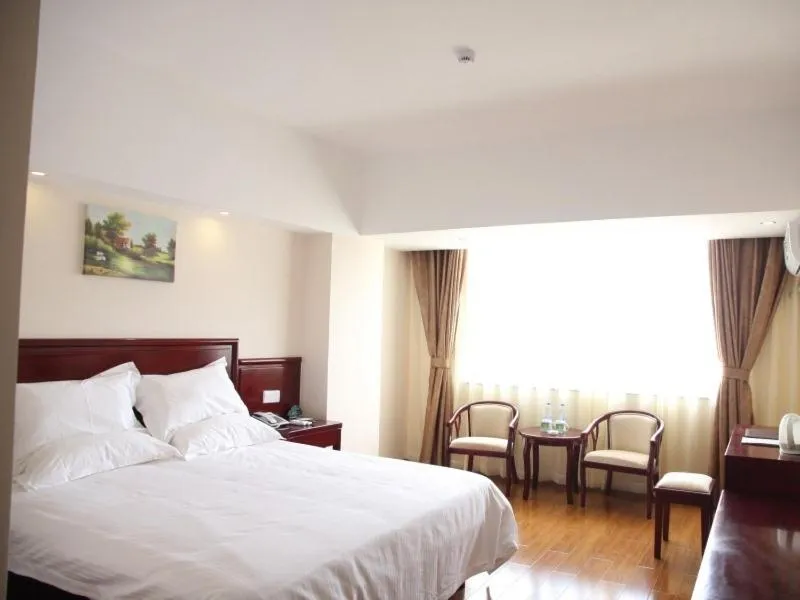 Bed in Greentree Inn Yunnan Lijiang Railway Station Yuxing Road Express Hotel