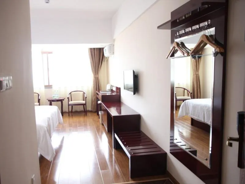 Bed in Greentree Inn Yunnan Lijiang Railway Station Yuxing Road Express Hotel