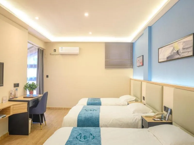 Bed in GreenTree Inn Henan Kaifeng Gulou Square Express hotel