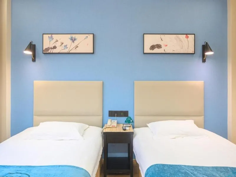 Bed in GreenTree Inn Henan Kaifeng Gulou Square Express hotel