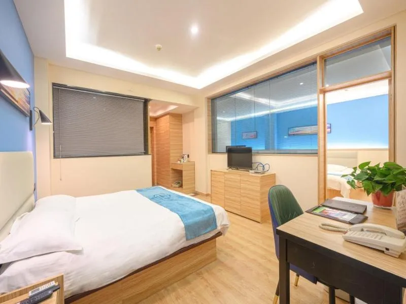 Bed in GreenTree Inn Henan Kaifeng Gulou Square Express hotel