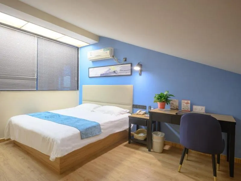 Bed in GreenTree Inn Henan Kaifeng Gulou Square Express hotel