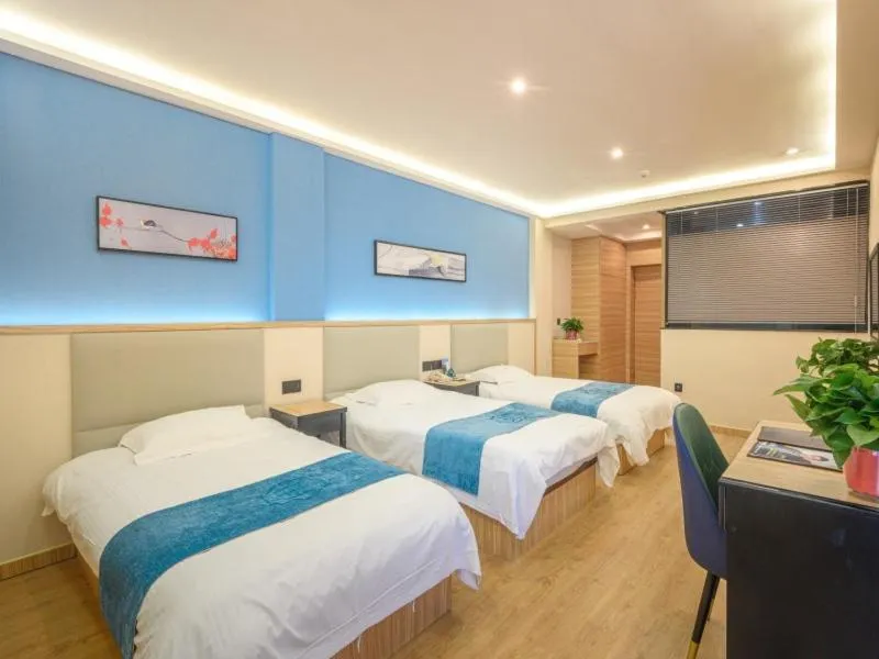 Bed in GreenTree Inn Henan Kaifeng Gulou Square Express hotel