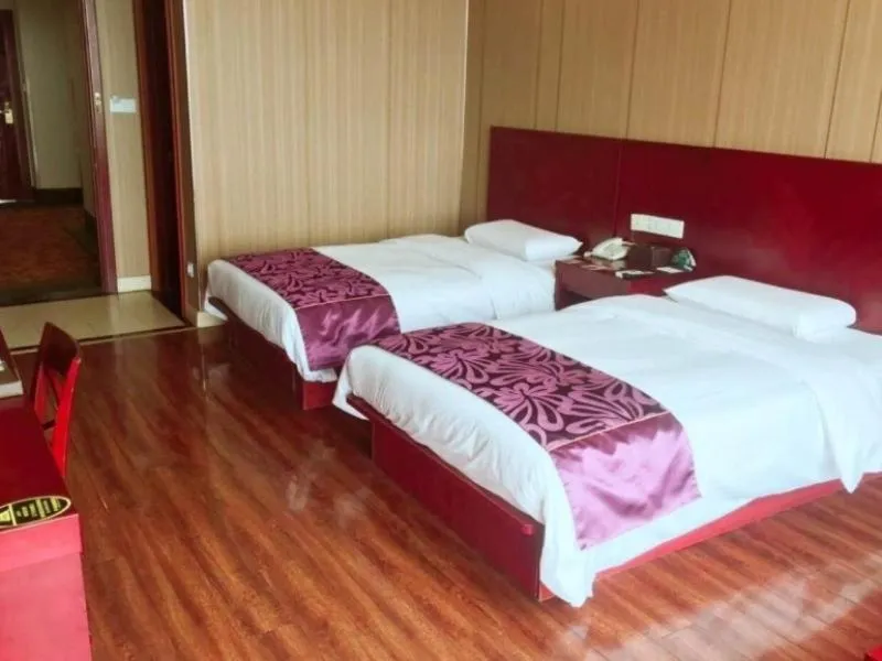 Bed in GreenTree Inn Jiangsu Wuxi Jiangyin Lingang New City Shengang Express Hotel