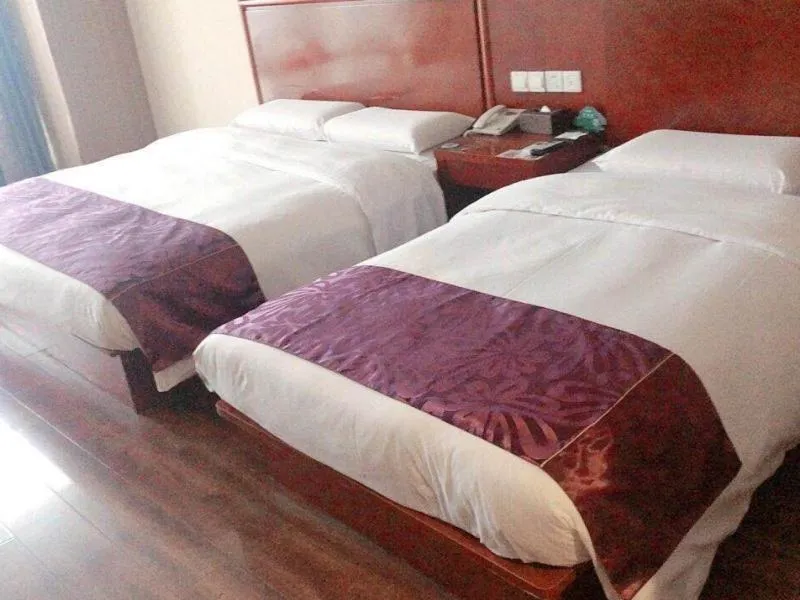 Bed in GreenTree Inn Jiangsu Wuxi Jiangyin Lingang New City Shengang Express Hotel