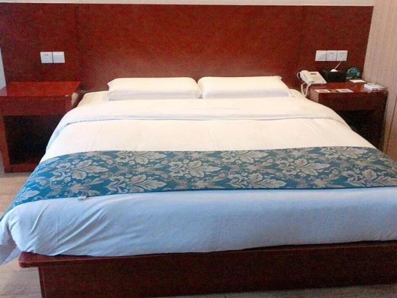 Bed in GreenTree Inn Jiangsu Wuxi Jiangyin Lingang New City Shengang Express Hotel