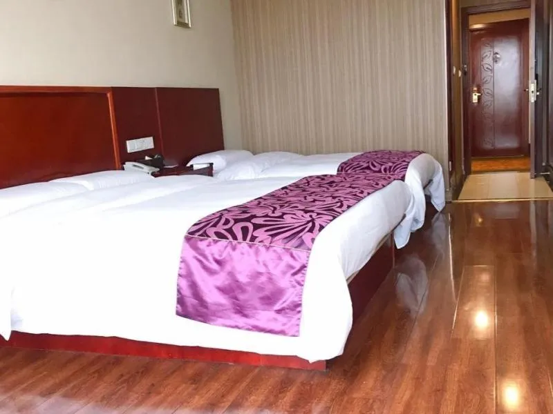 Bed in GreenTree Inn Jiangsu Wuxi Jiangyin Lingang New City Shengang Express Hotel
