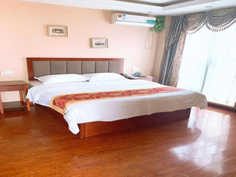 Bed in GreenTree Inn Jiangsu Wuxi Xibei Town Xingtiandi Shell Hotel