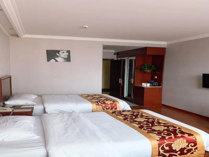 Bed in GreenTree Inn Jiangsu Wuxi Xibei Town Xingtiandi Shell Hotel