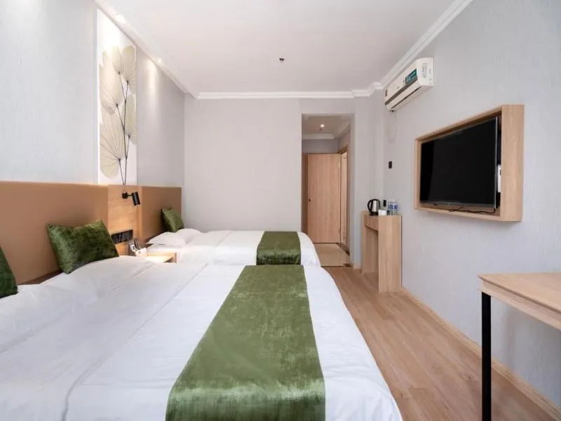 Bed in GreenTree Inn Jiangsu Wuxi Taihu Avenue Tongyang Road Express Hotel
