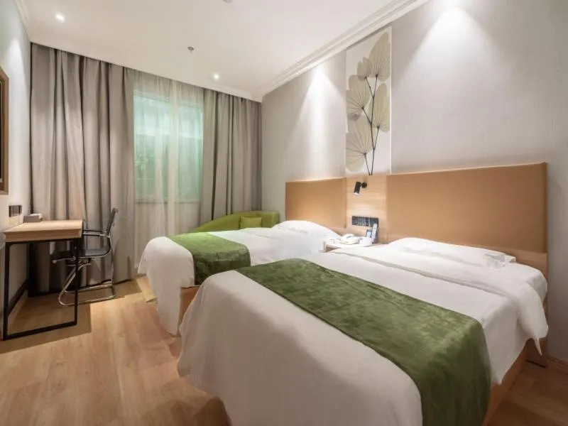 Bed in GreenTree Inn Jiangsu Wuxi Taihu Avenue Tongyang Road Express Hotel