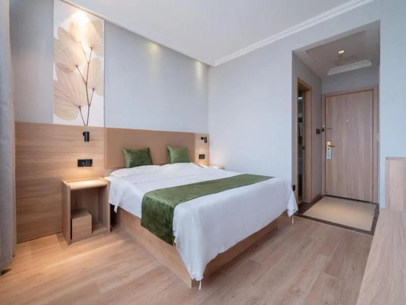 Bed in GreenTree Inn Jiangsu Wuxi Taihu Avenue Tongyang Road Express Hotel