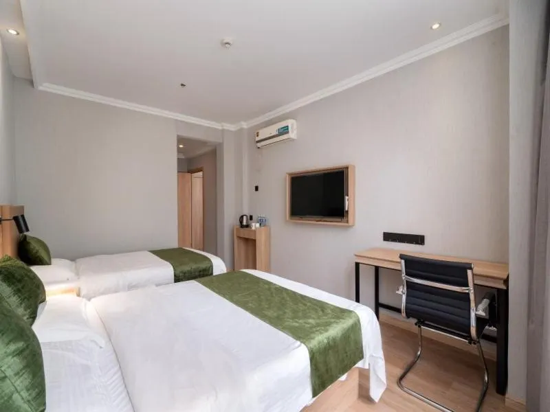 Bed in GreenTree Inn Jiangsu Wuxi Taihu Avenue Tongyang Road Express Hotel