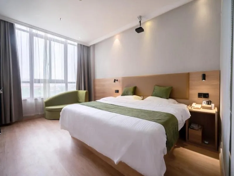 Bed in GreenTree Inn Jiangsu Wuxi Taihu Avenue Tongyang Road Express Hotel