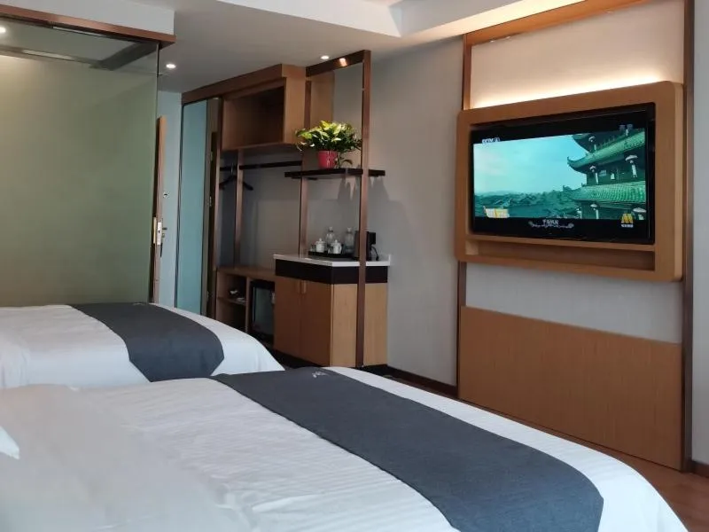 Bed in GreenTree Inn Jiangsu Wuxi Hudai FuAn Commercial Plaza Business Hotel