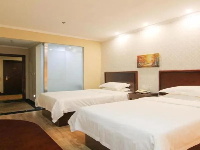 Bed in GreenTree Inn JiangSu ZhenJiang DingMao Industrial Park WoDe Square Express Hotel