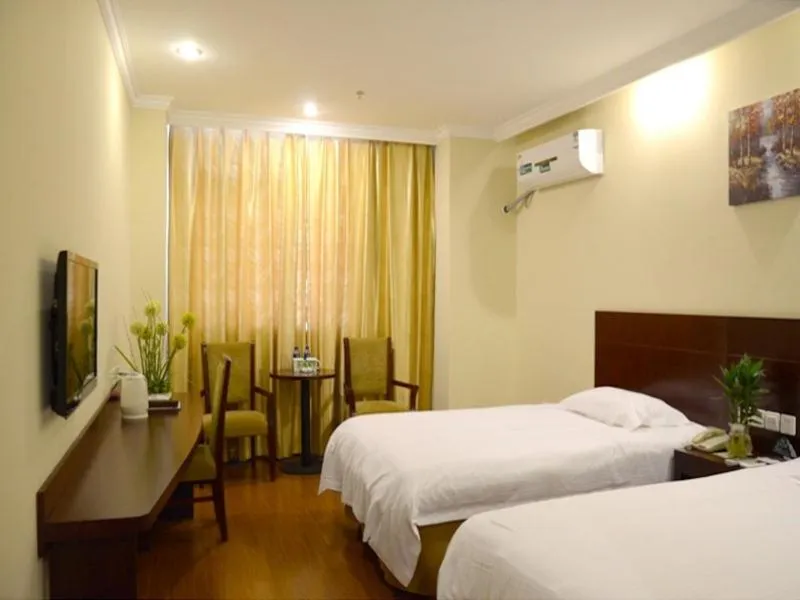 Bed in GreenTree Inn Jiangsu Nantong Rugao Haiyang Road Tiancheng Business Hotel