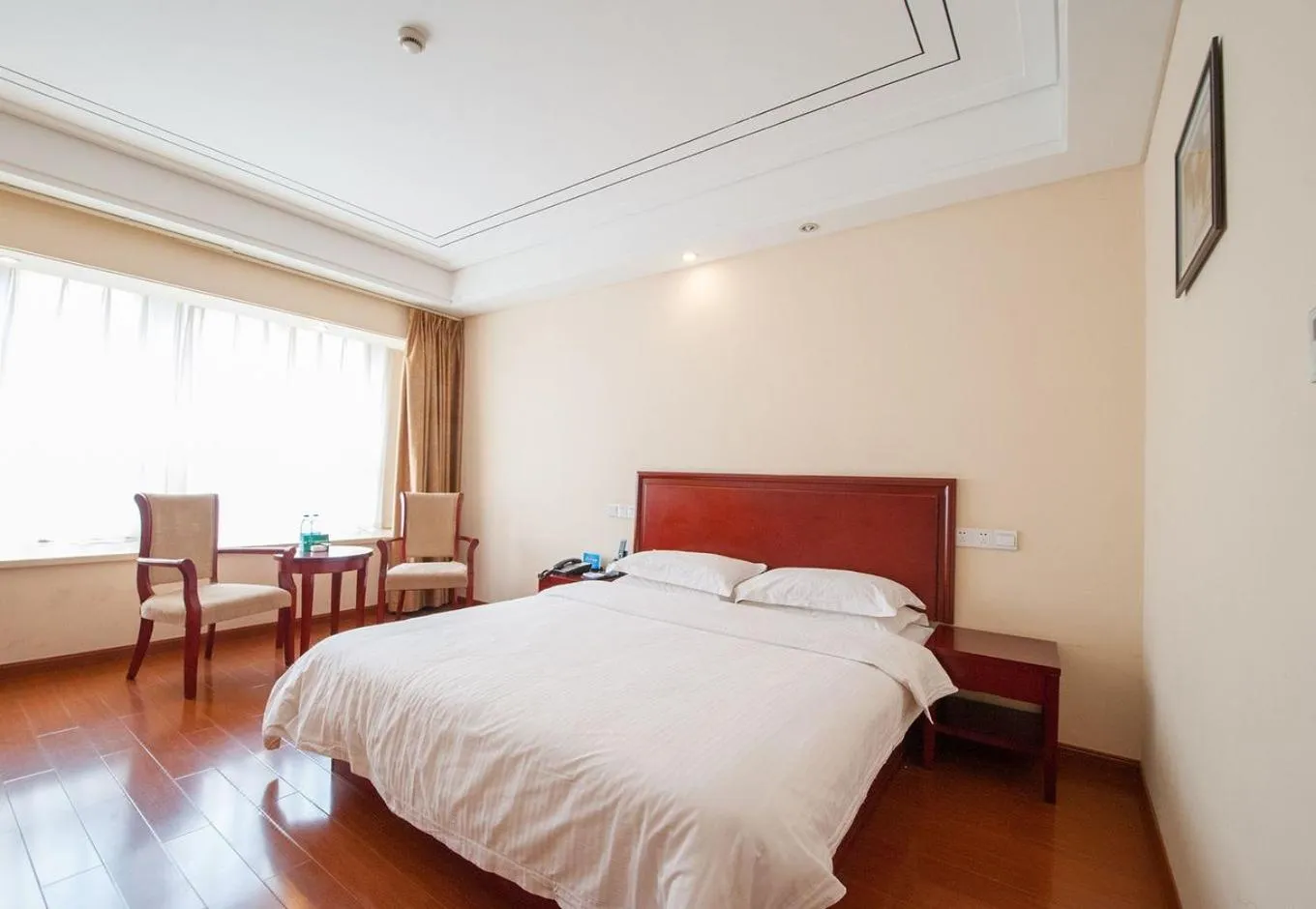 Bed in GreenTree Inn Jiangsu Nantong Haimen Sanchang North Wangjiang Road Business Hotel