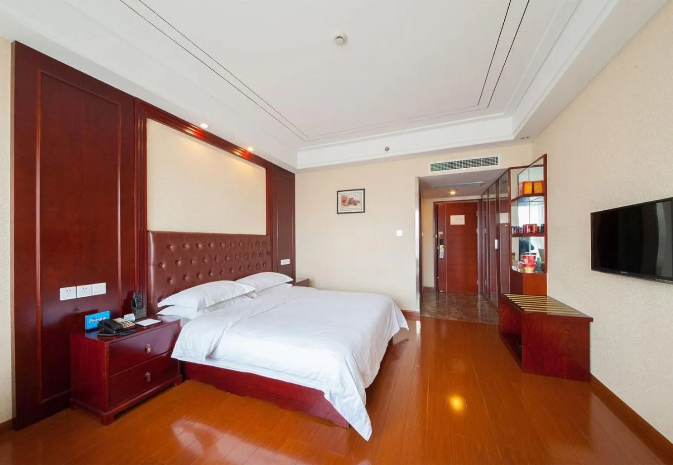 Bed in GreenTree Inn Jiangsu Nantong Haimen Sanchang North Wangjiang Road Business Hotel
