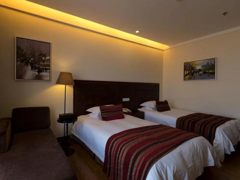 Bed in GreenTree Inn Jiangsu Nantong Qidong Middle Heping Road Business Hotel