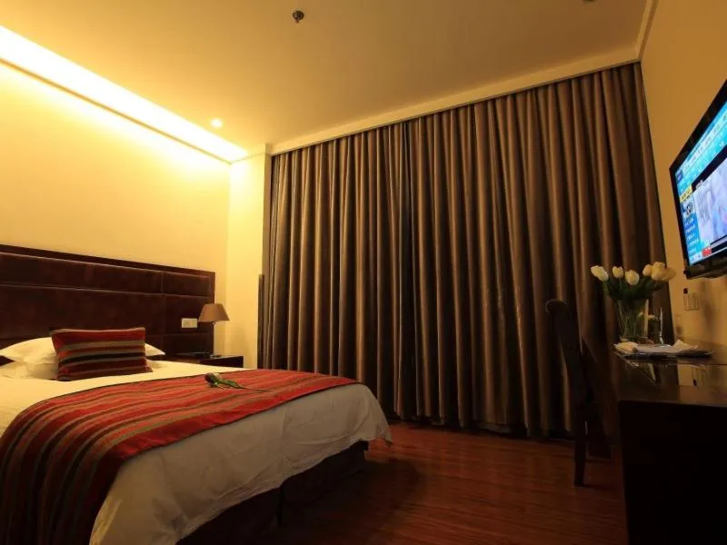 Bed in GreenTree Inn Jiangsu Nantong Qidong Middle Heping Road Business Hotel