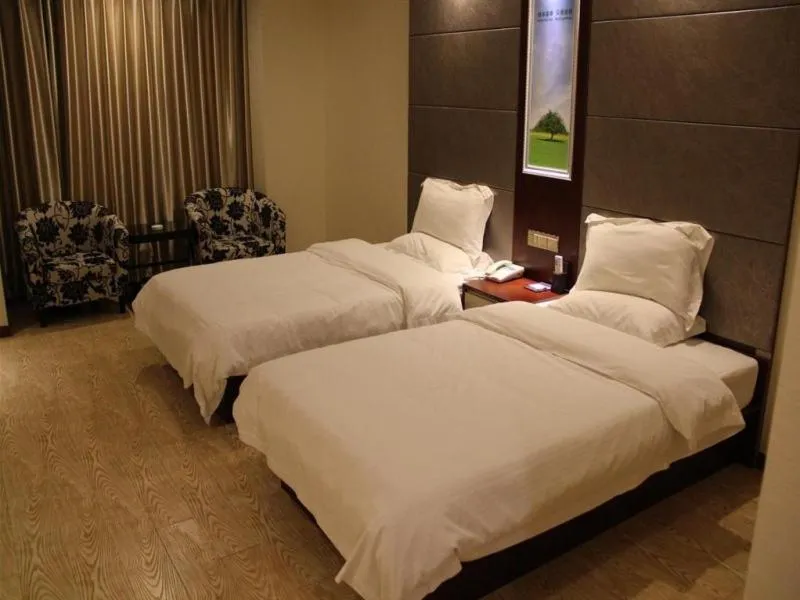 Bed in GreenTree Inn Jiangsu Nantong Tongzhou Shiji Avenue Jianghaihuangdu Express Hotel