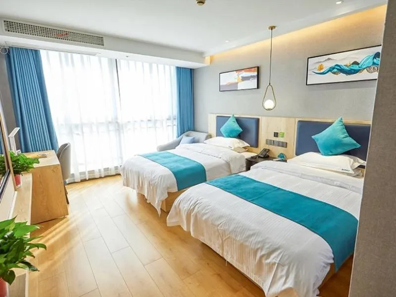 Bed in GreenTree Inn Jiangsu Nantong Textile City Bus Station Express Hotel