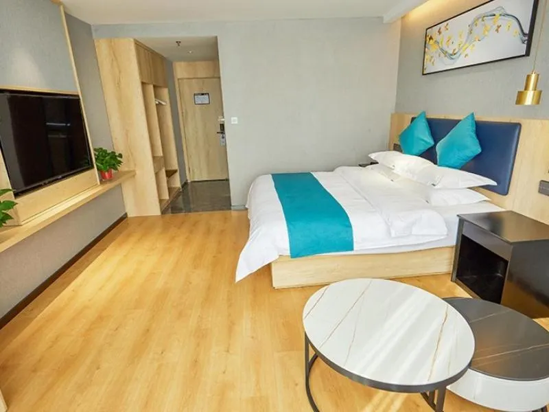 Bed in GreenTree Inn Jiangsu Nantong Textile City Bus Station Express Hotel