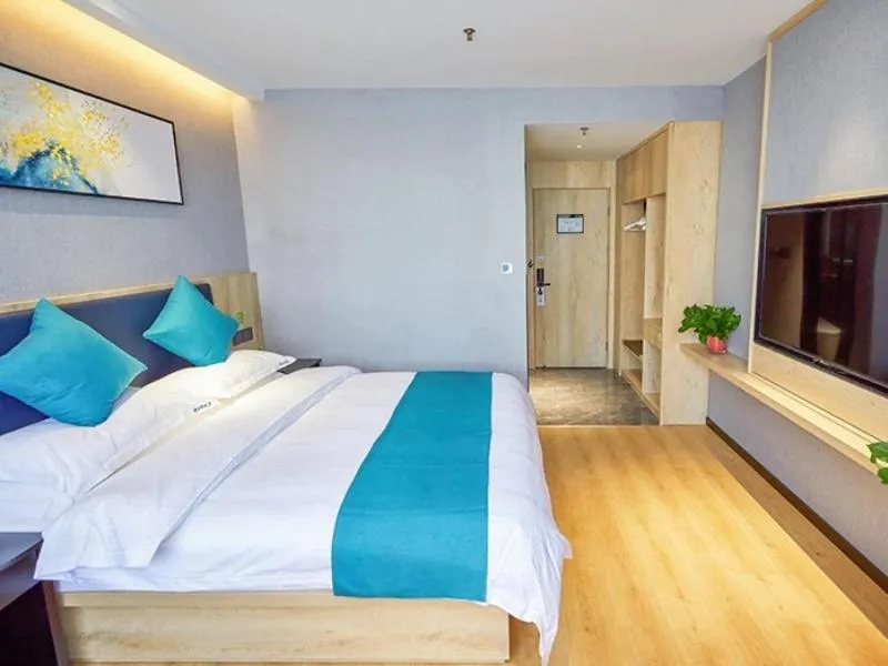 Bed in GreenTree Inn Jiangsu Nantong Textile City Bus Station Express Hotel