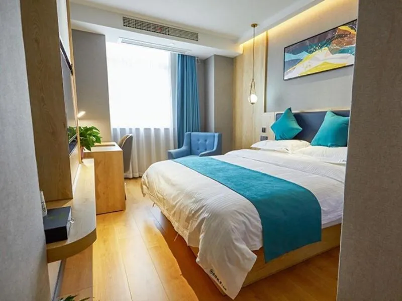 Bed in GreenTree Inn Jiangsu Nantong Textile City Bus Station Express Hotel