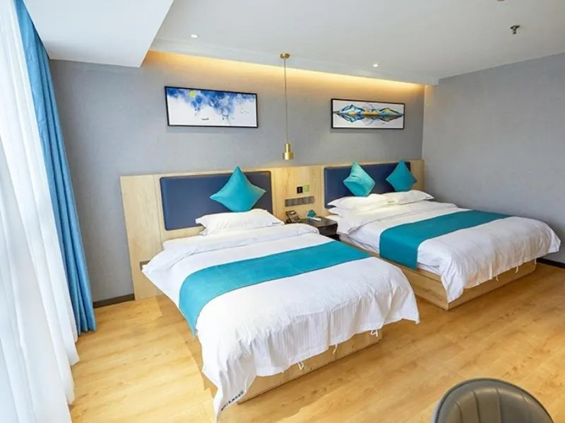 Bed in GreenTree Inn Jiangsu Nantong Textile City Bus Station Express Hotel